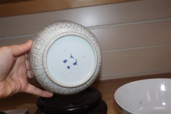 A Chinese crackle glaze bowl, early 20th century blue and white bowl and a wood stand largest diameter 17cm